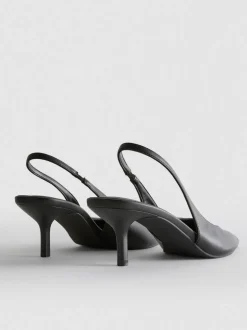Zapatos de tacón de piel sintética destalonados