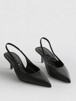 Zapatos de tacón de piel sintética destalonados