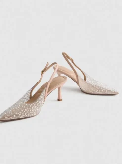 Zapatos de tacón destalonados con tira posterior