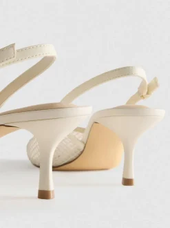 Zapatos de tacón destalonados de horma ancha